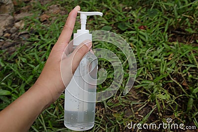 Gel alcohol female hands hand sanitizer gel to patient eliminate germs covid 19 prevention concept Stock Photo